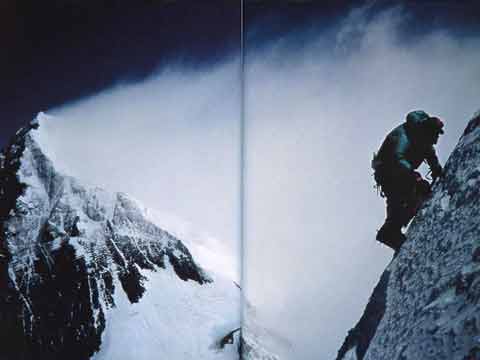 
Rob Hall took this photo of Ed Viesturs approaching the precarious wafer-thin summit of Lhotse on May 16, 1994, with Everest behind - Himalayan Quest: Ed Viesturs on the 8,000-Meter Giants book
